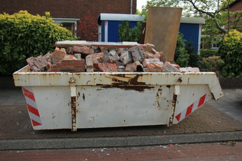 Van ready for commercial waste removal outside Sutton shop